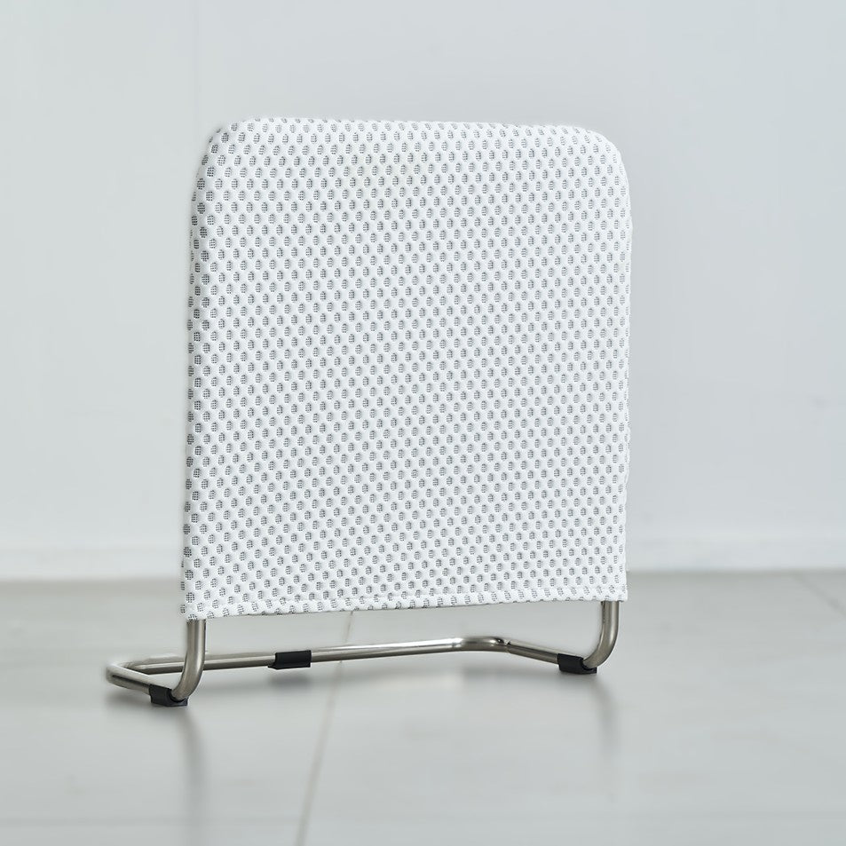White supporting bar with a patterned backrest on a gray background