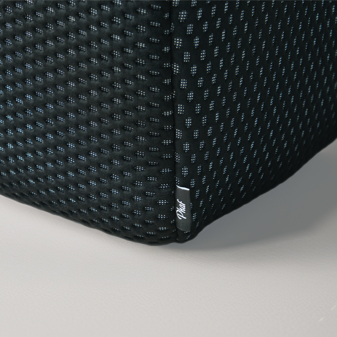 Black textured bag with a visible brand logo "PHAF" on a light gray background