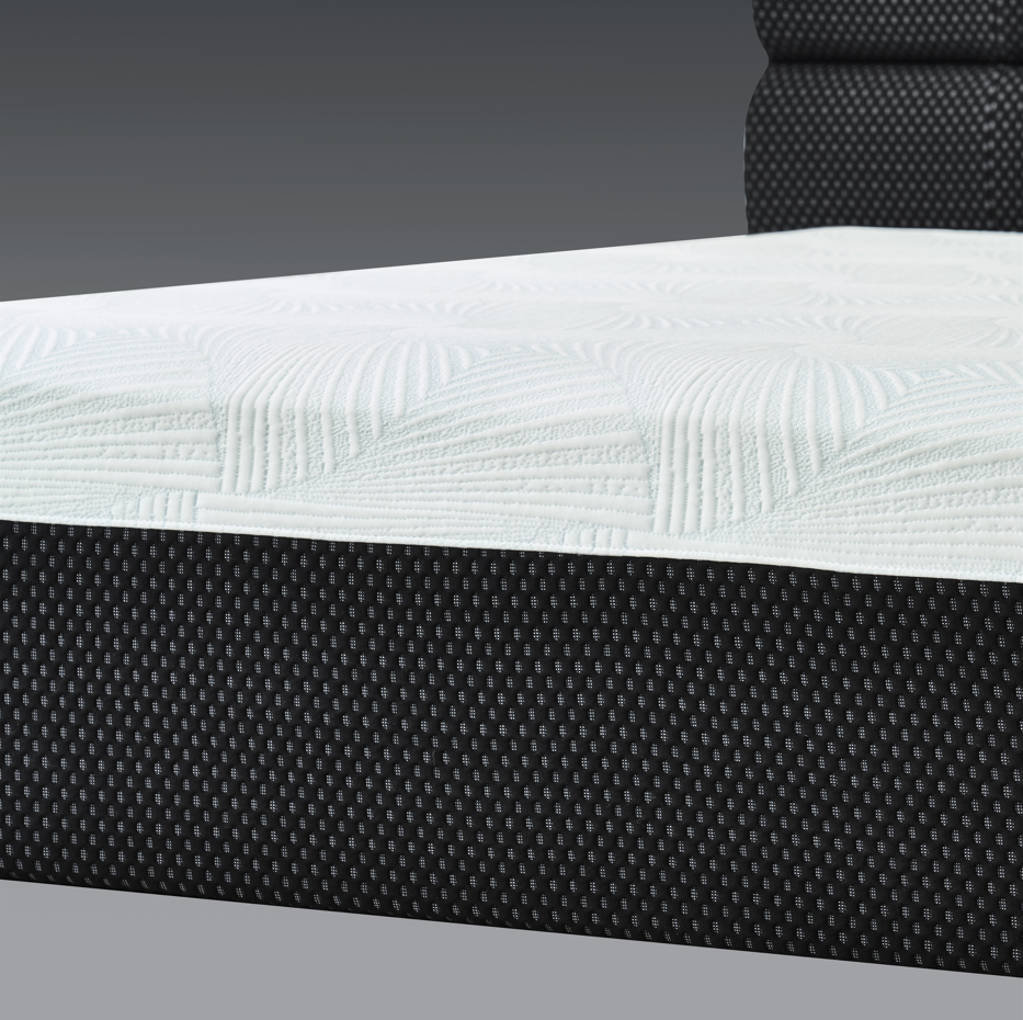 Close-up of a Bed Frame and mattress in one piece with a textured surface on a gray background