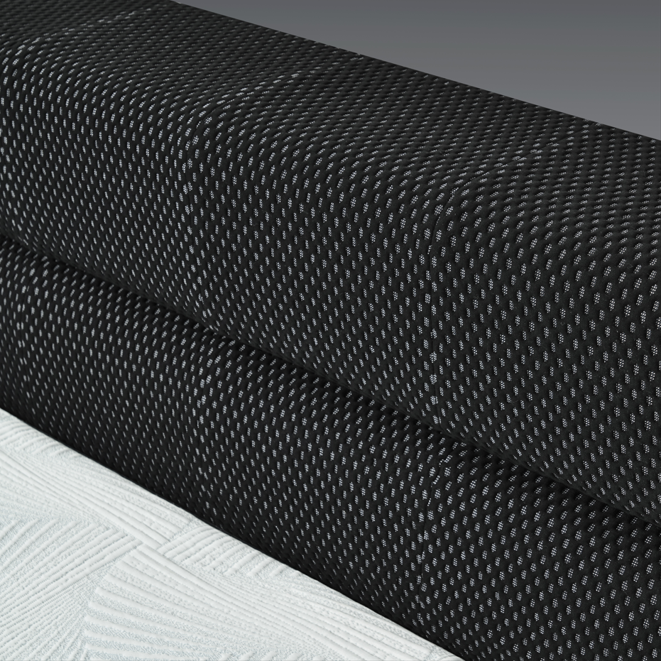 Close-up of black and white textured fabric samples.