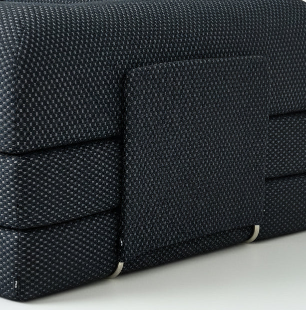 Side view of Black textured three sit sleeping sofa with a Sofa Supporting Metal stand with matching color 