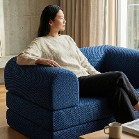 Modern Phaf single sofa with sleek design and neutral fabric, perfect for small living spaces.