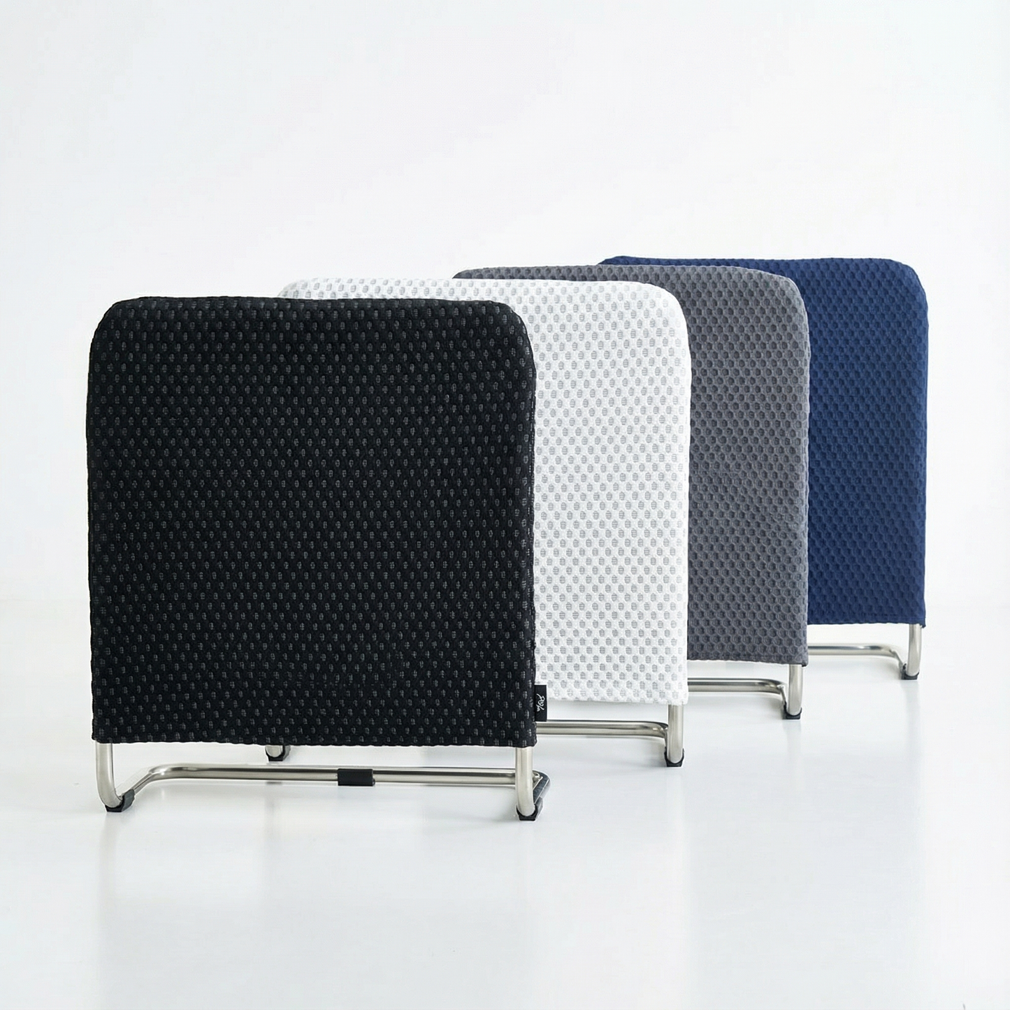 Four supporting bars with textured backs in black, white, gray, and blue on a light gray background