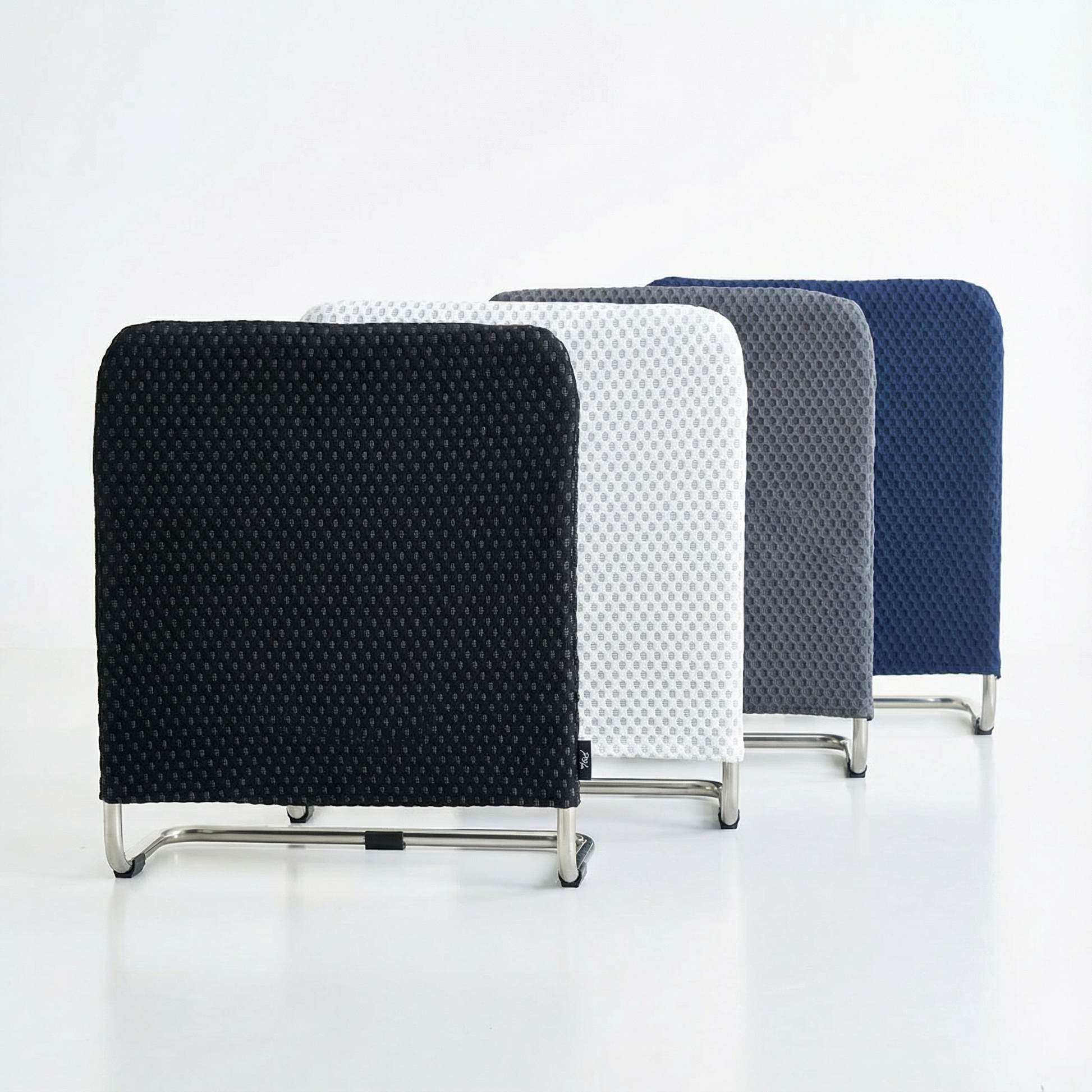 Four supporting bars with textured backs in black, white, gray, and blue on a light gray background