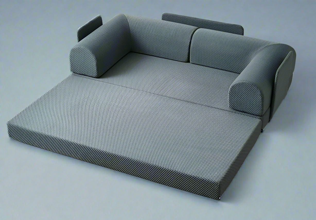 Gray Sleeper sofa open to a "watch TV " position.