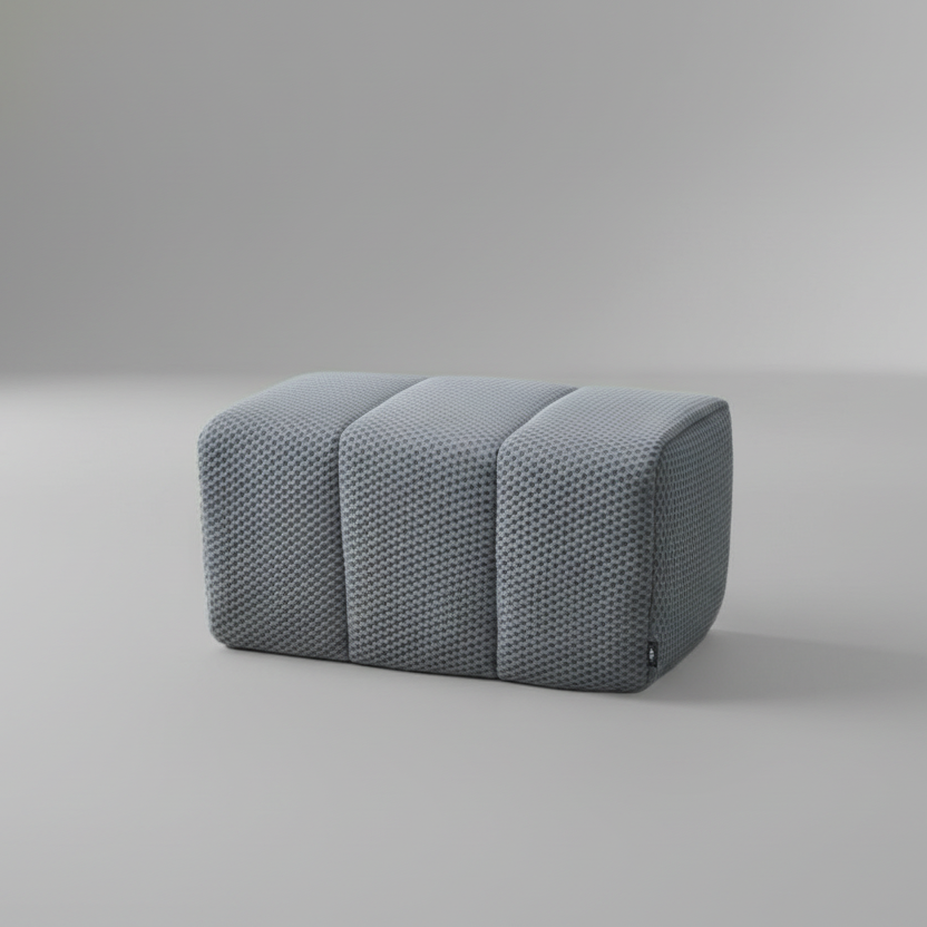Gray textured ottoman on a beige background