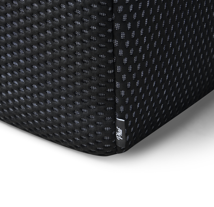 Black Toto Ottoman by Phaf, showcasing a sleek, modern upholstered footstool with a smooth black fabric finish.